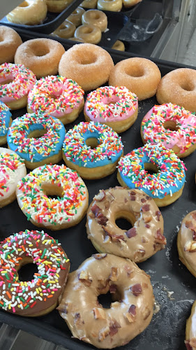 Happy Donuts.Hwy14 storefront