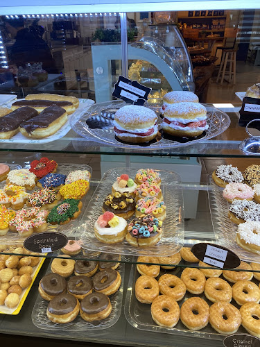 The Queen's Coffee & Donut cafe storefront